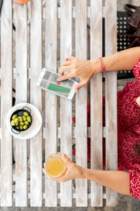 High angle view of woman having breakfast