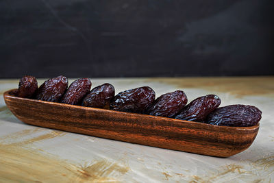 Close-up of fruits in bowl on table