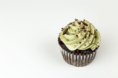 Close-up of cupcake against white background
