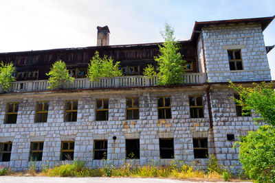 Low angle view of old building against sky