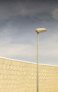 Low angle view of street light against sky