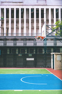 View of basketball court against building