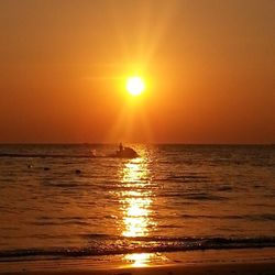 Scenic view of sea at sunset