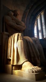 Low angle view of buddha statue