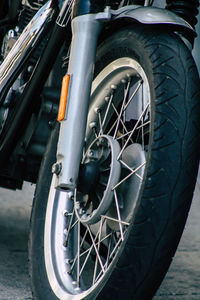 Close-up of bicycle parked on street