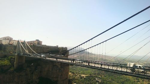 Suspension bridge against clear sky