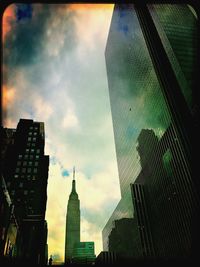 Low angle view of modern buildings against sky