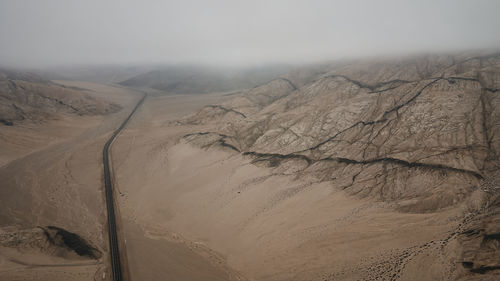 Scenic view of desert against sky