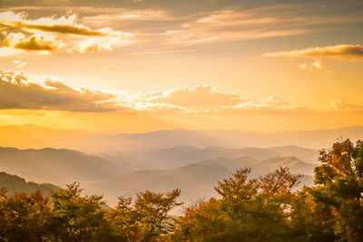 Scenic view of mountains against sky during sunset