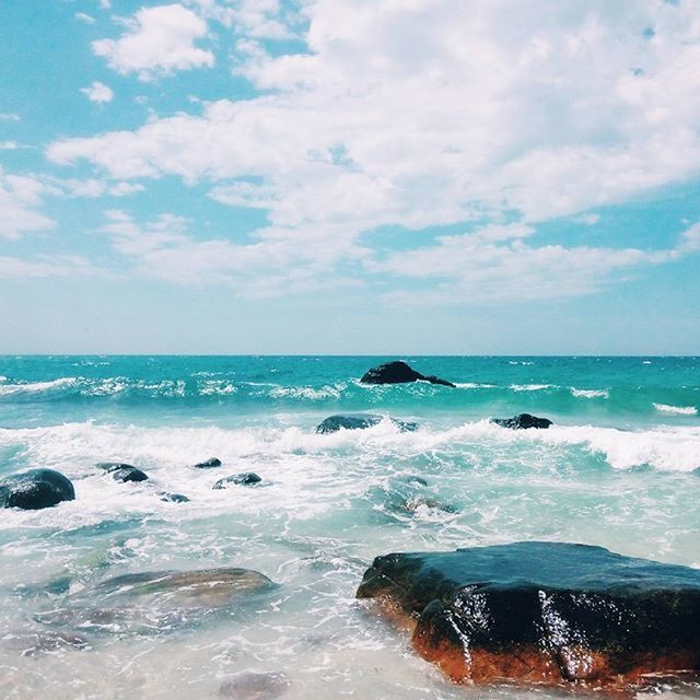 sea, water, horizon over water, wave, beach, surf, sky, scenics, beauty in nature, shore, tranquil scene, nature, motion, tranquility, rock - object, idyllic, cloud - sky, seascape, blue, outdoors