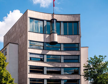 Low angle view of modern building against sky