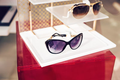 Close-up of sunglasses on table