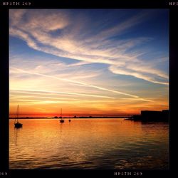 Scenic view of sea at sunset