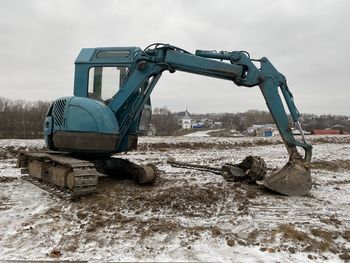 Construction site on field against sky