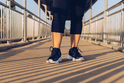 Woman walking exercise on the overpass