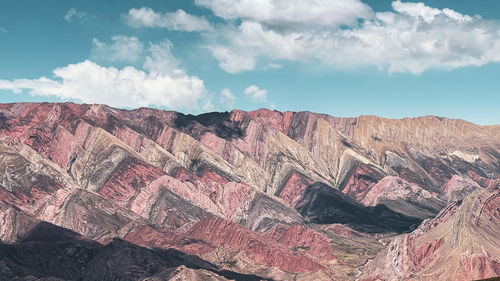 Panoramic view of rocky mountains against sky