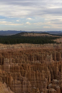 View of landscape against cloudy sky