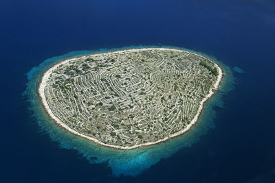 Baljenac island with ancient dry walls in adriatic, croatia