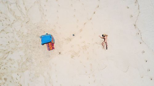 Close-up of umbrella on beach