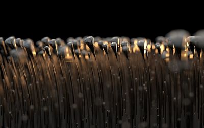 Close-up of pipes against black background