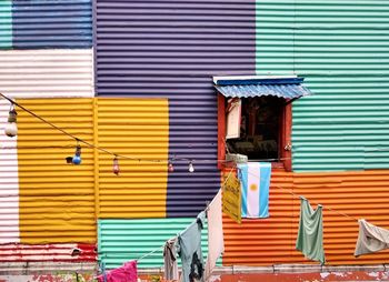 Graffiti on closed shutter of building