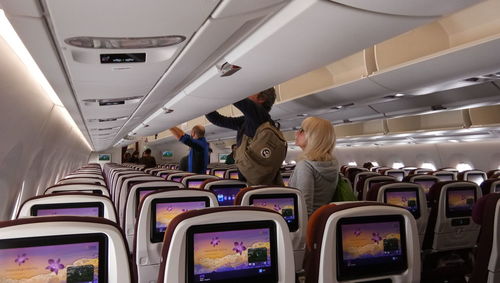 People sitting in airplane