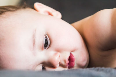 Close-up of cute boy at home