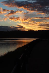 Scenic view of sunset over lake