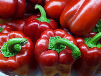 Close-up of red bell peppers for sale in market