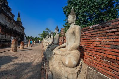 Statue of historic building against sky