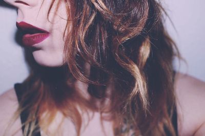 Close-up of young woman with brown hair