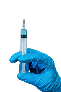 Person holding umbrella against white background