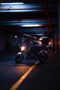 Vehicles on road at night