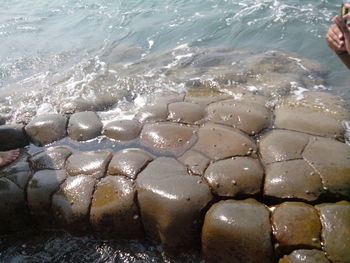 People standing on rocks