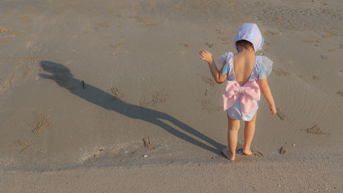 Full length of woman on beach