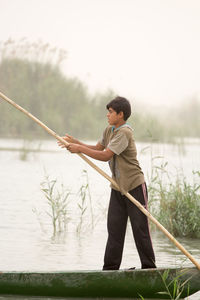 Man looking at lake