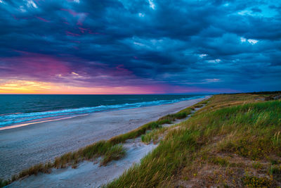 Scenic view of sea against sky during sunset