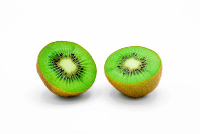 Close-up of bananas against white background