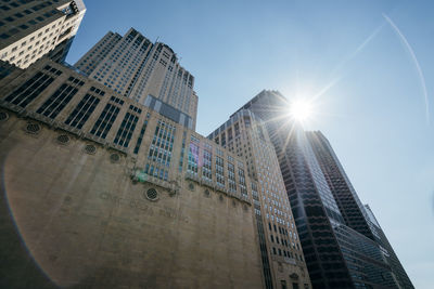 Low angle view of modern buildings against sky