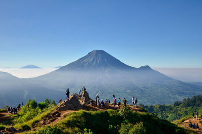 Group of people on mountain range