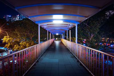 Empty footbridge at night