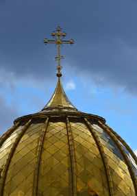 Low angle view of built structure against blue sky