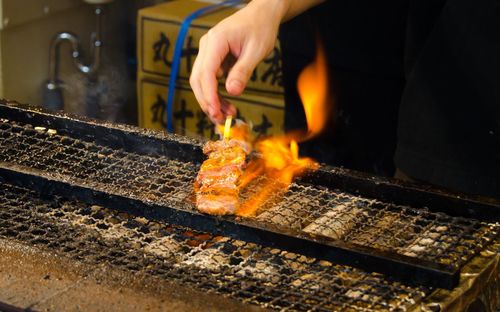 Kobe beef being cooked in an street grill