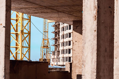 Construction of multi-storey building.yellow cranes