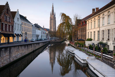 Historic buildings on the canals of bruges, belgium