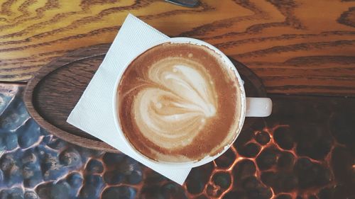 Directly above shot of cappuccino on table