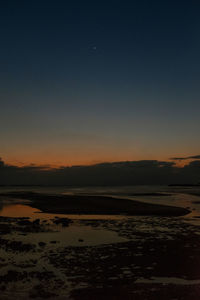 Scenic view of landscape at sunset