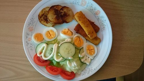 High angle view of breakfast served on table