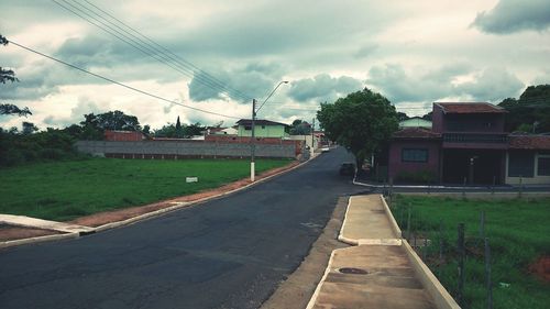 View of road against cloudy sky