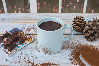 High angle view of coffee cup on table